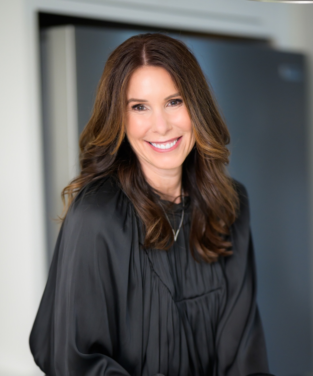 Portrait of Victoria D Valle, listing agent