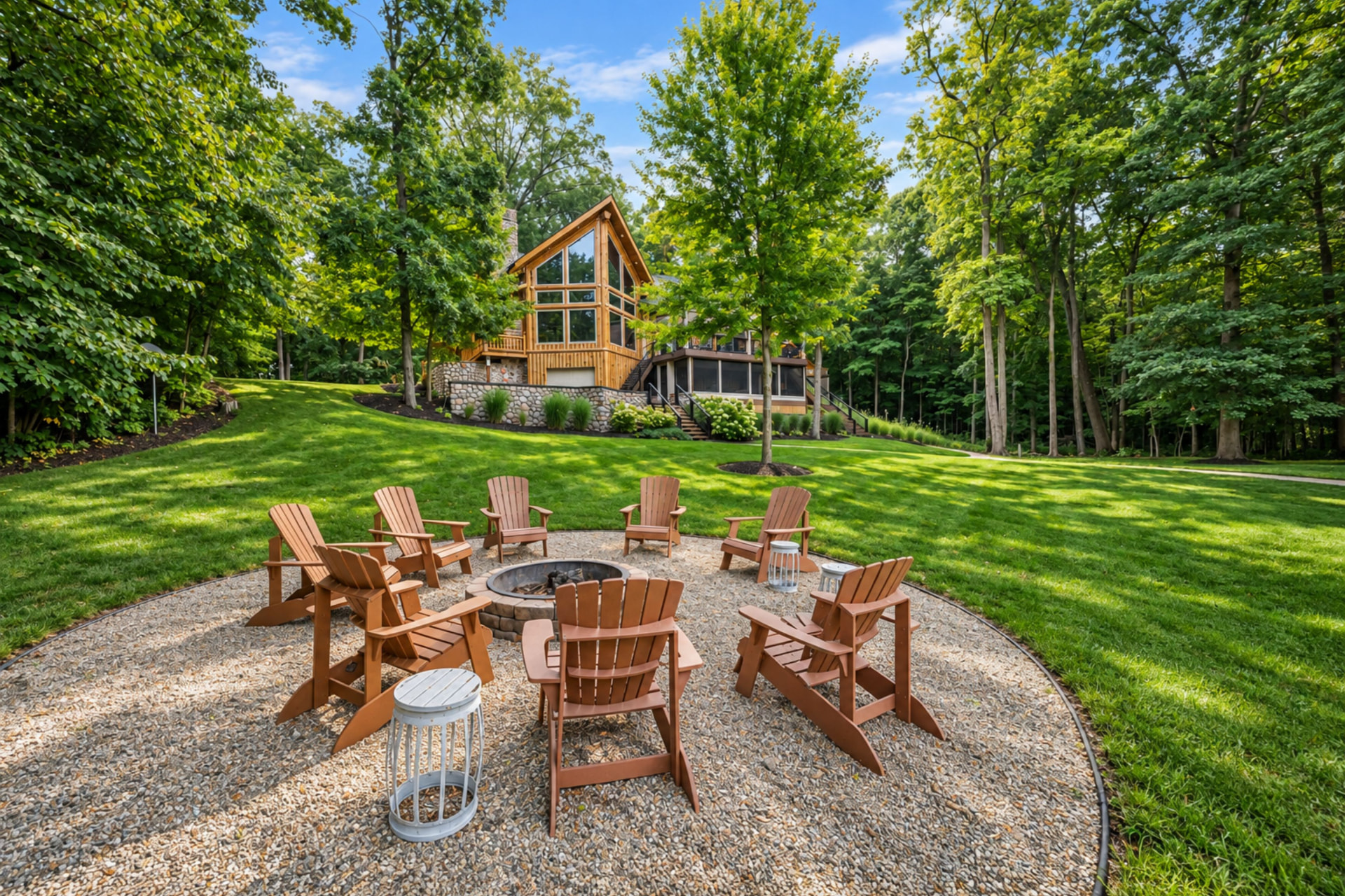 Stone fire pit ringed with seating on the lawn