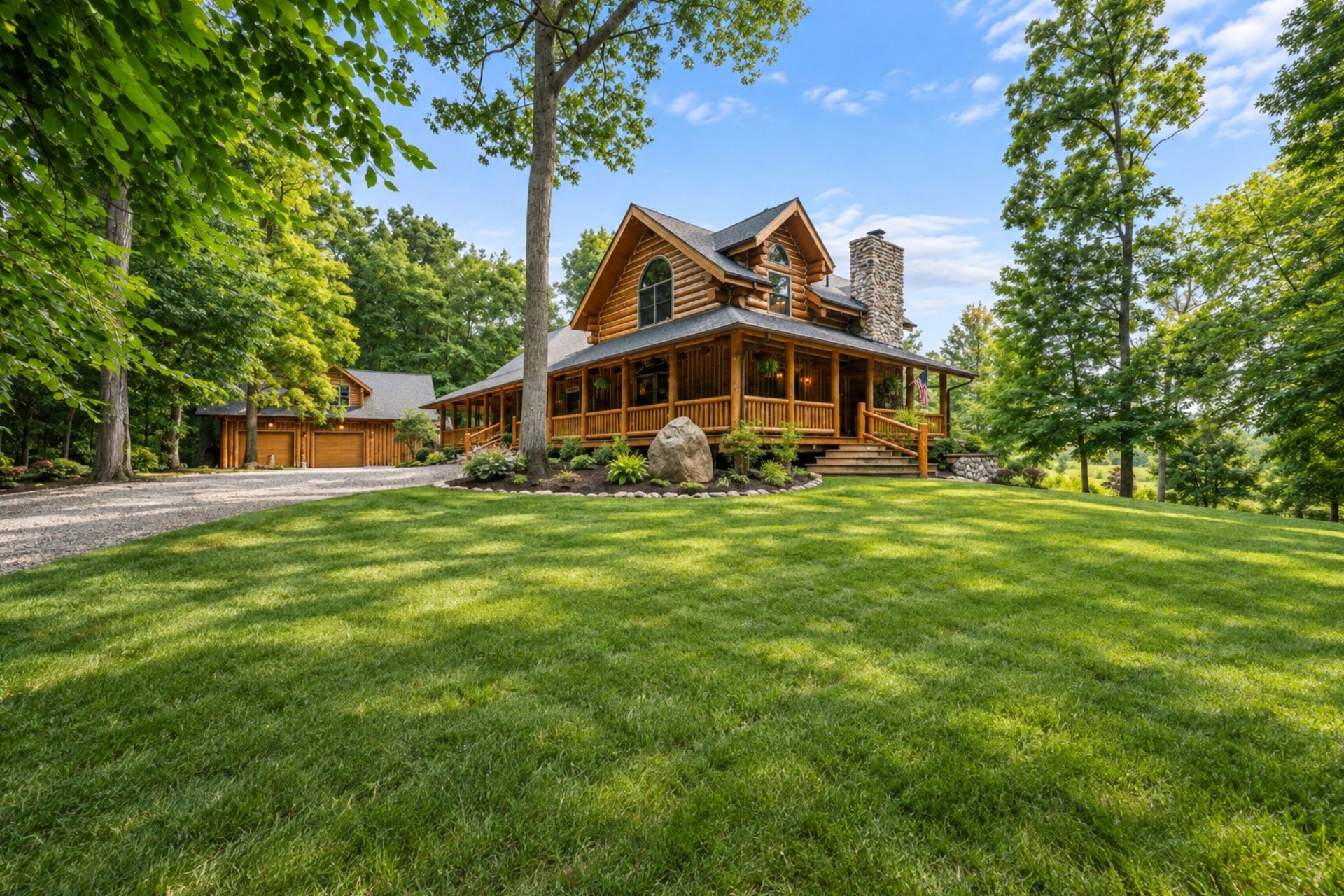 Hand-built log home and detached garage