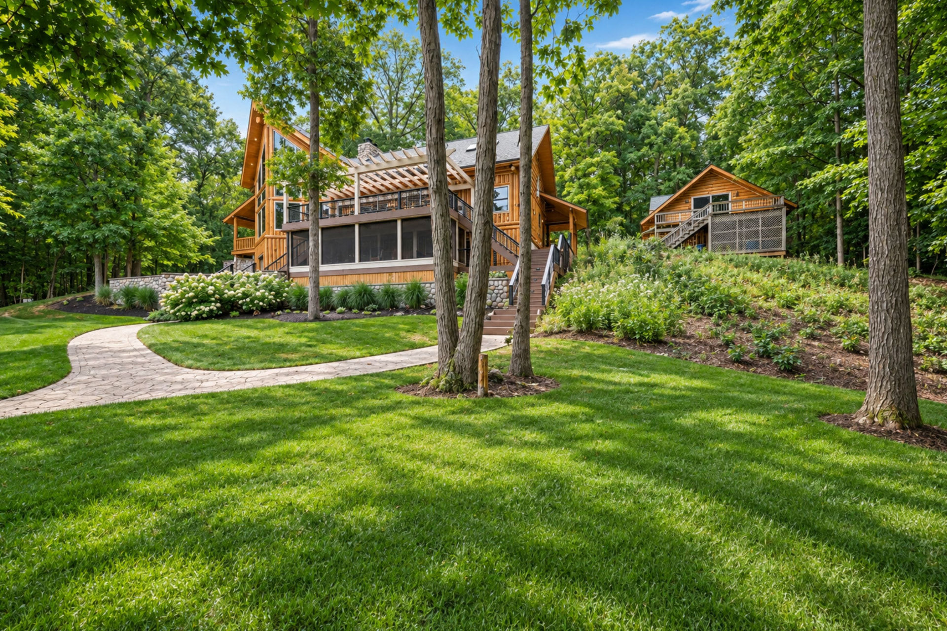 Screened lower level and upper deck among mature woods
