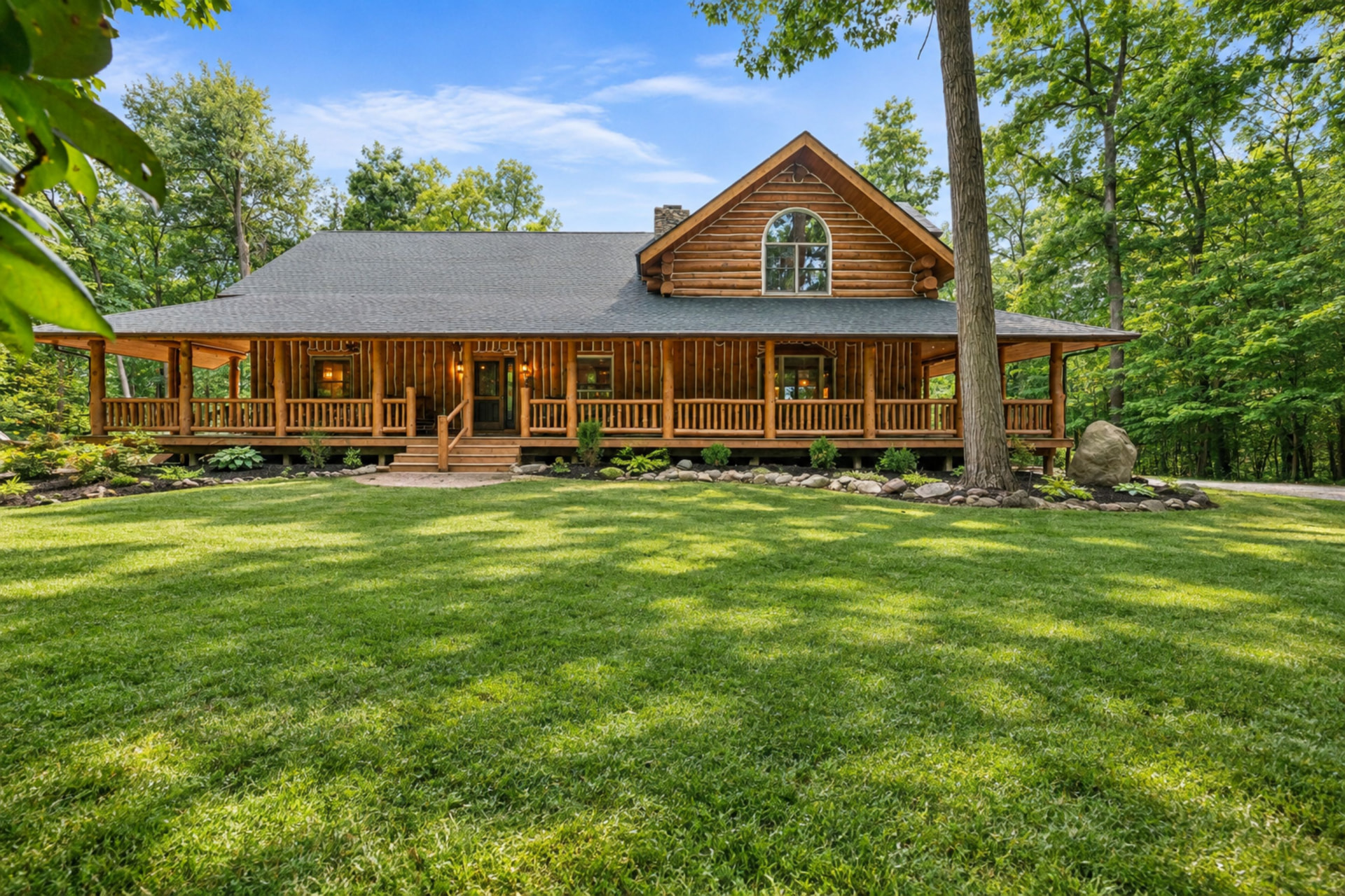 Wraparound covered porch across the front elevation